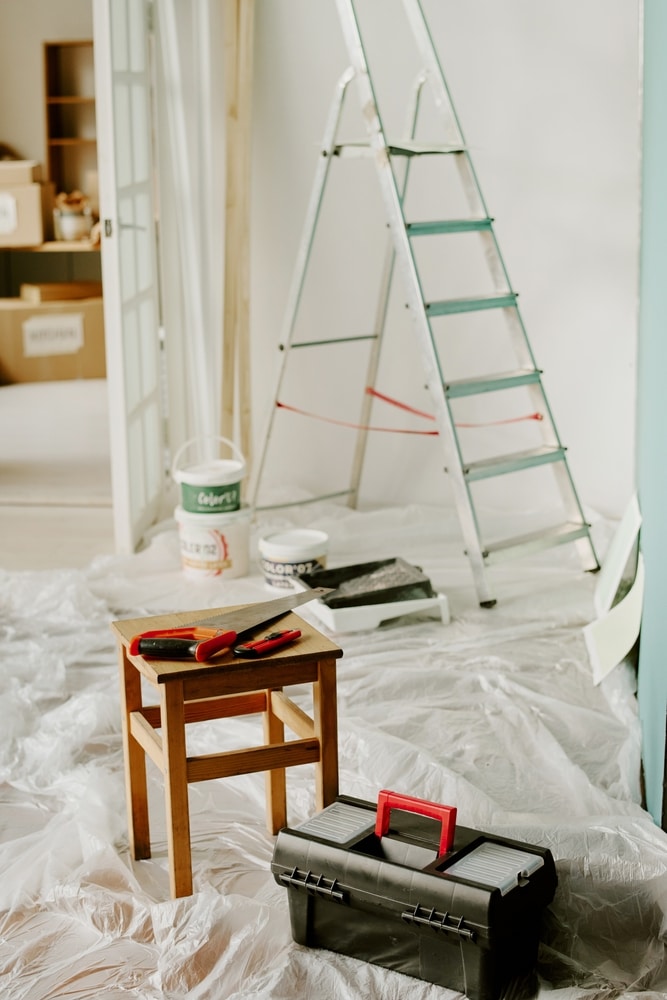 Renovating,New,Home,,Painting,Walls,And,Preparing,Space,For,Moving,